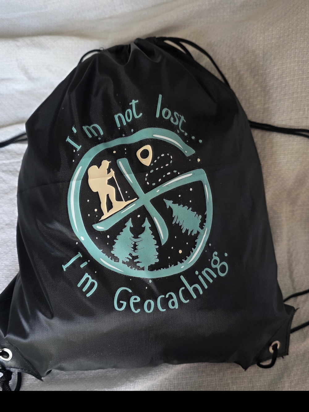 Geocaching Drawstring Backpack in Black and Teal